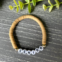 Load image into Gallery viewer, Tan colored bracelet says senior