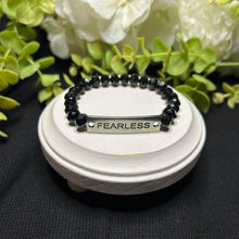 Load image into Gallery viewer, black beaded bracelet says &quot;FEARLESS&quot;
